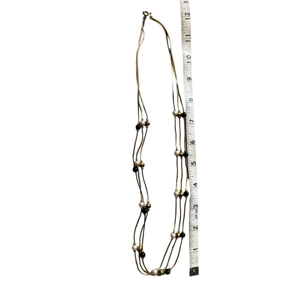 White, Black and Gold Three Strand Necklace - Picture 5 of 7